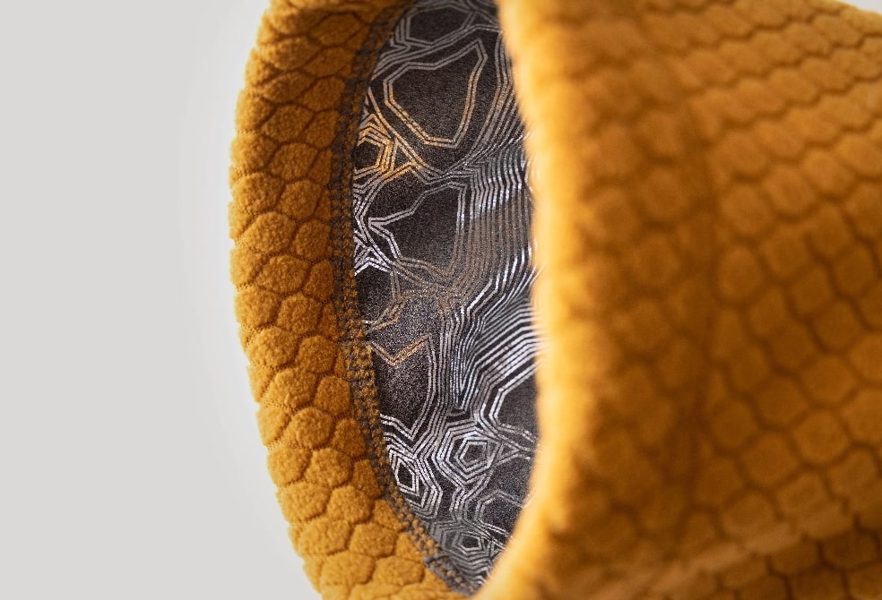 Inside Warming Midlayer ECO jacket is a foil patterned jersey lining that reflects body heat for extra warming